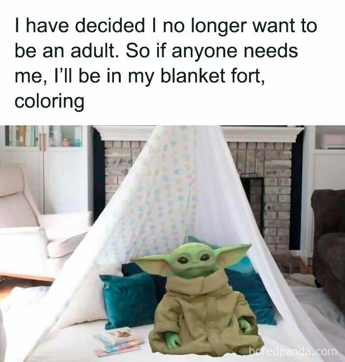 Cute plush toy in a blanket fort next to coloring books, humorously avoiding adulting.