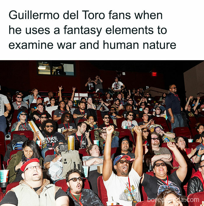 Audience in a movie theater reacting with excitement and laughter to funny movie memes that hit harder than some films.