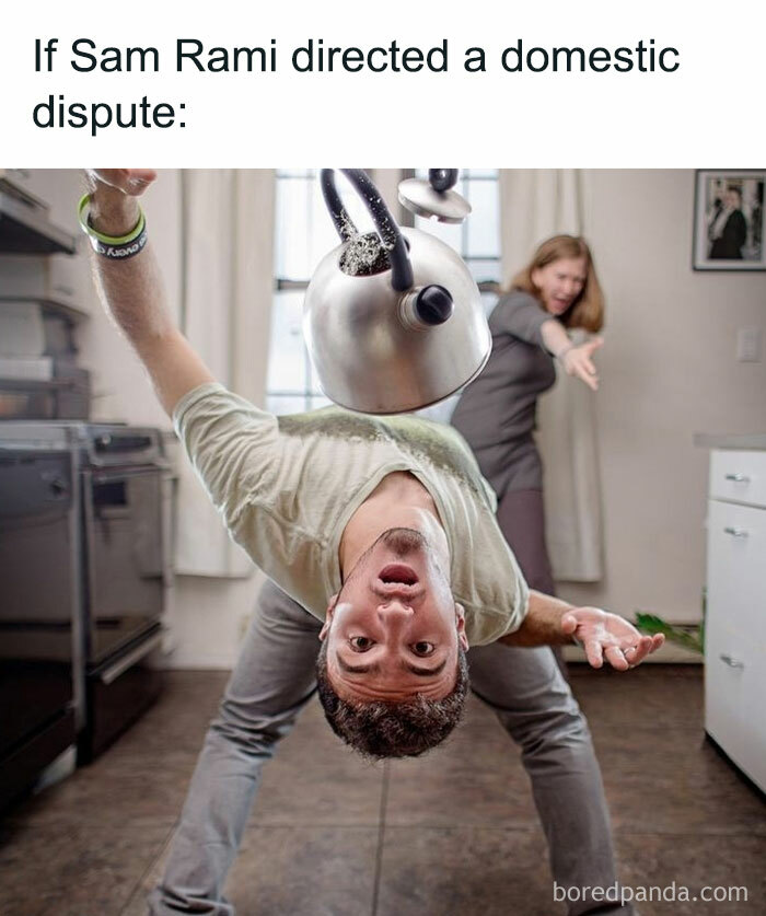 Man leaning backward dramatically as kettle spills water, woman in background pointing, funny movie memes scene.