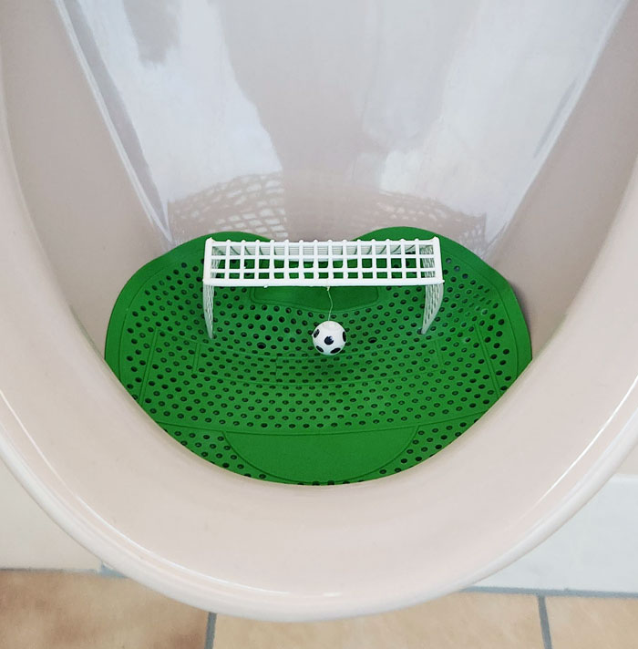 A Soccer Urinal Game In A Restaurant In Germany