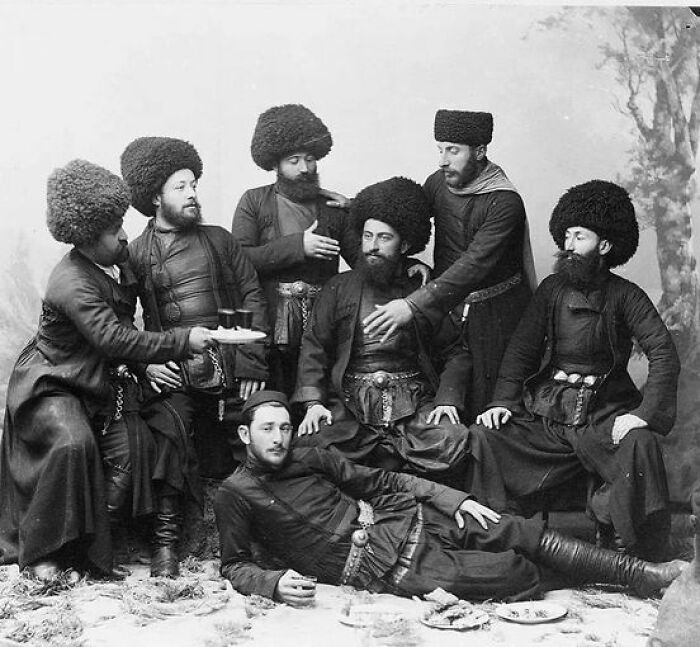Georgian Men Wearing Traditional Horse-Riding Gear At A Community Gathering. In The Georgia Governorate, Russian Empire, Circa 1890