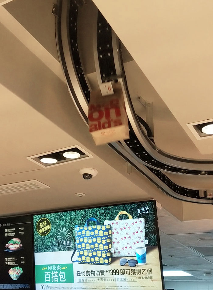 This McDonald's Has A Smaller Counter Upstairs, And They Use A Conveyer Belt To Ship Food