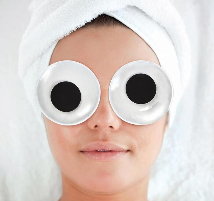 Woman with towel on head and funny oversized eye patches, a humorous idea for Mother's Day gifts.