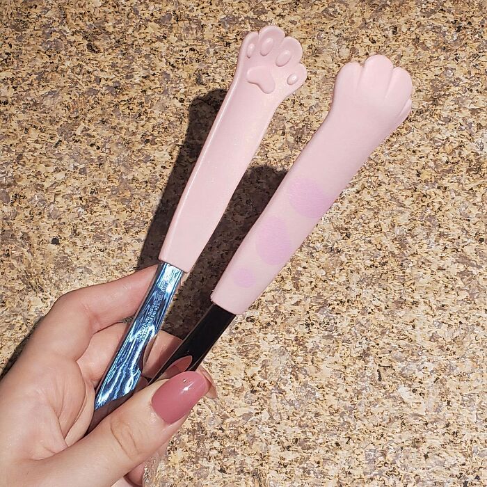 Pink paw-shaped kitchen items, innovative and functional on a countertop.