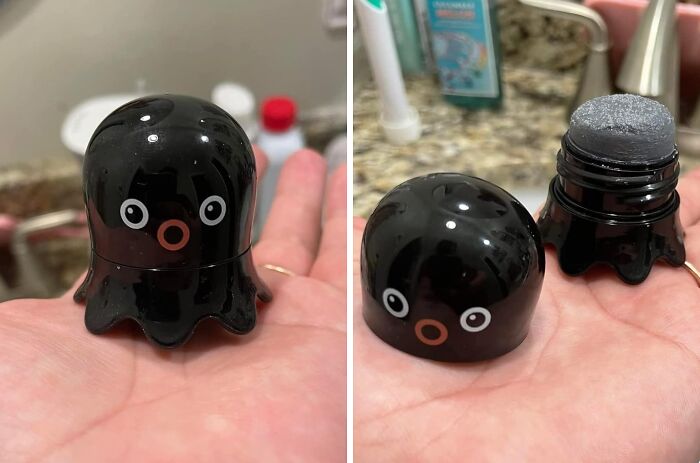 Black octopus-shaped cosmetic product with a sponge tip applicator, popular trending item in the Pandaverse virtual market.