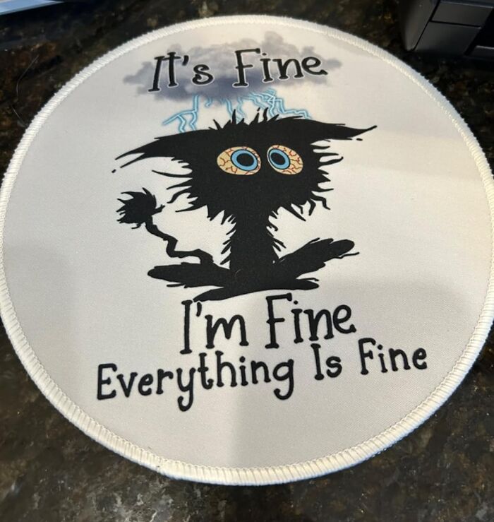 This Black Cat Mouse Pad Proves That Some Office Humour Is Always Valued 