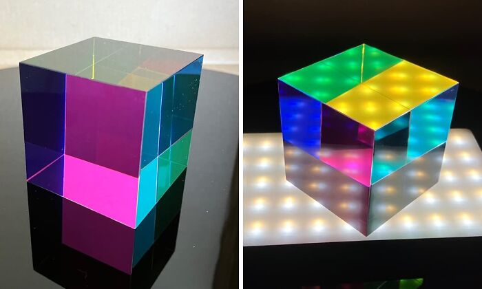 Colorful transparent cube reflecting vibrant lights, showcasing trending products in the Pandaverse virtual marketplace.