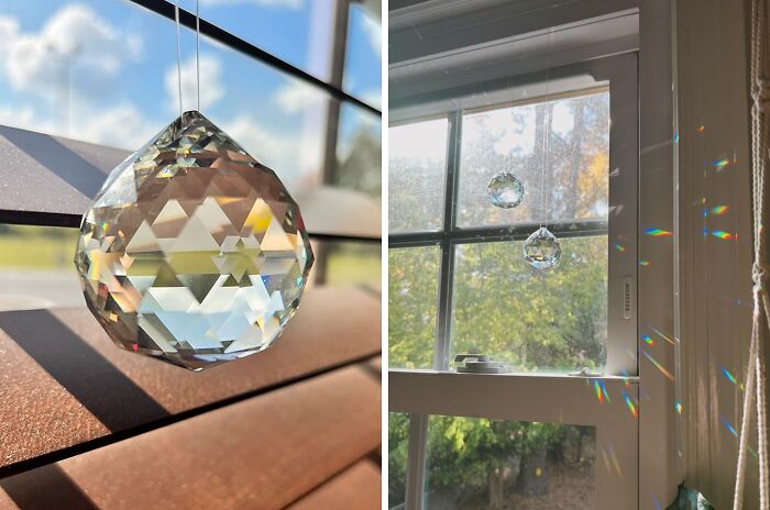 Crystal prism hanging in a window, casting colorful light reflections, a trending product in the Pandaverse virtual market.