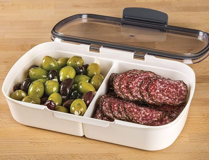 Container with olives and salami, an innovative fridge and pantry storage solution.