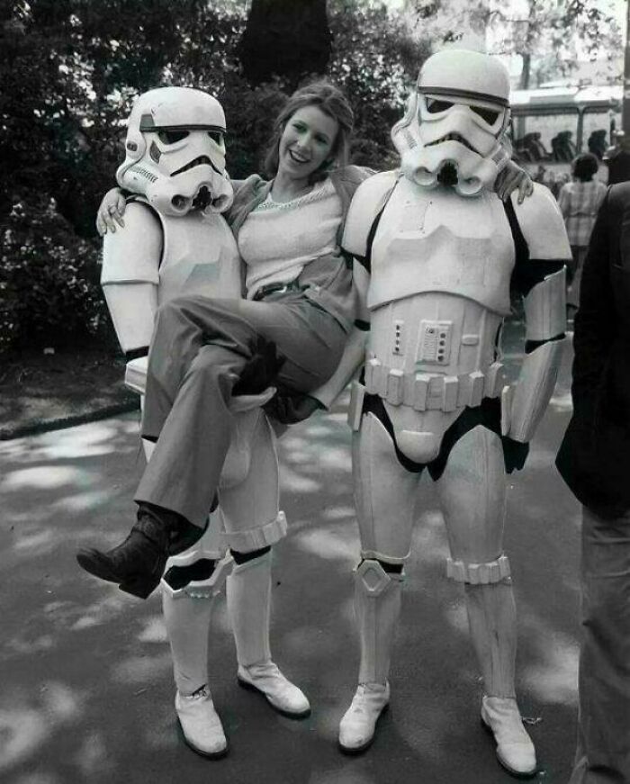 Carrie Fisher Hanging Out With Some Stormtroopers While Promoting “Empire Strikes Back” In London, 1980