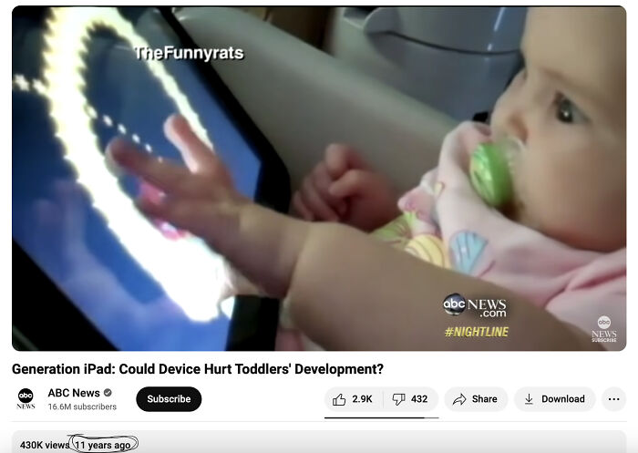 Baby with pacifier interacting with iPad, highlighting predictions on technology's impact on toddlers' development.