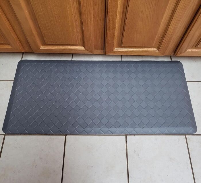 If You HAVE To Spend Time In Front Of The Stove, Try An Anti-Fatigue Kitchen Rug