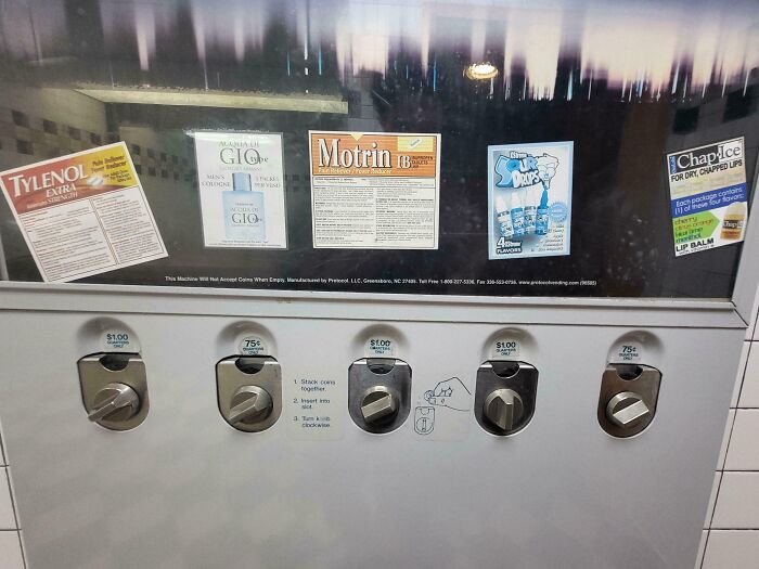 The Men's Bathroom In This Movie Theatre Had A Vending Machine For Pain Meds, Chapstick, Cologne, And Candy