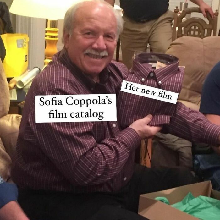 Man holding a shirt labeled her new film, referencing Sofia Coppola’s film catalog in a funny movie meme format.