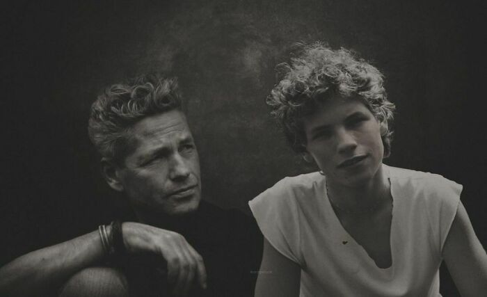 Celebrities photoshopped side-by-side, older self in black shirt, younger version in white shirt, showing passage of time.