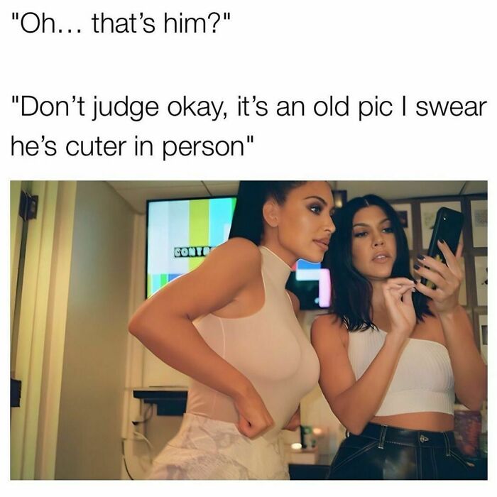 Two women looking at a phone together, with one holding it up. Text above reads humorous conversation.