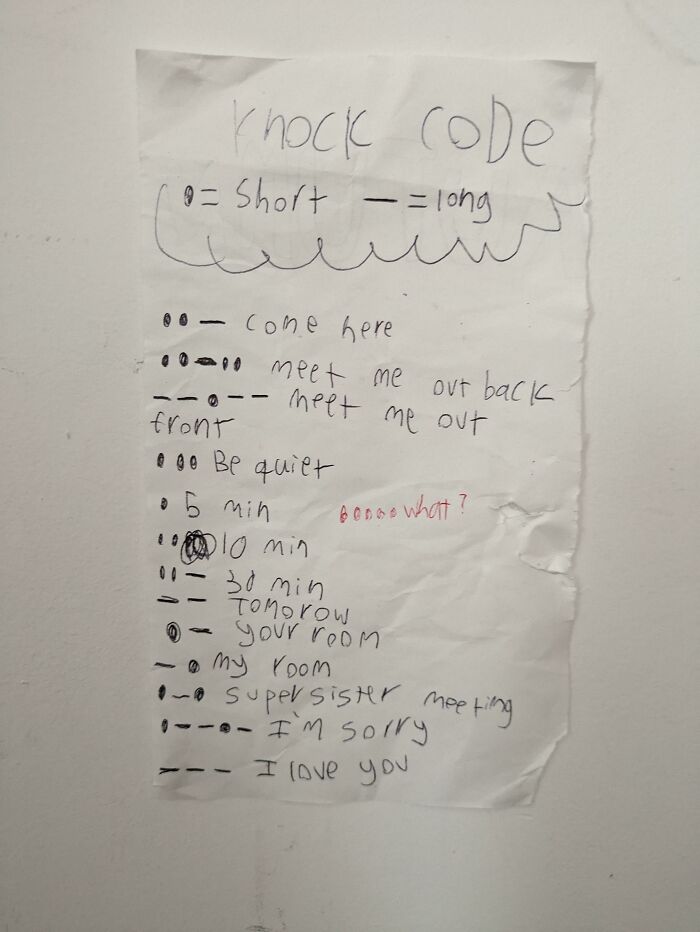 Handwritten knock code note with funny messages demonstrating wholesome dad communication and humor.