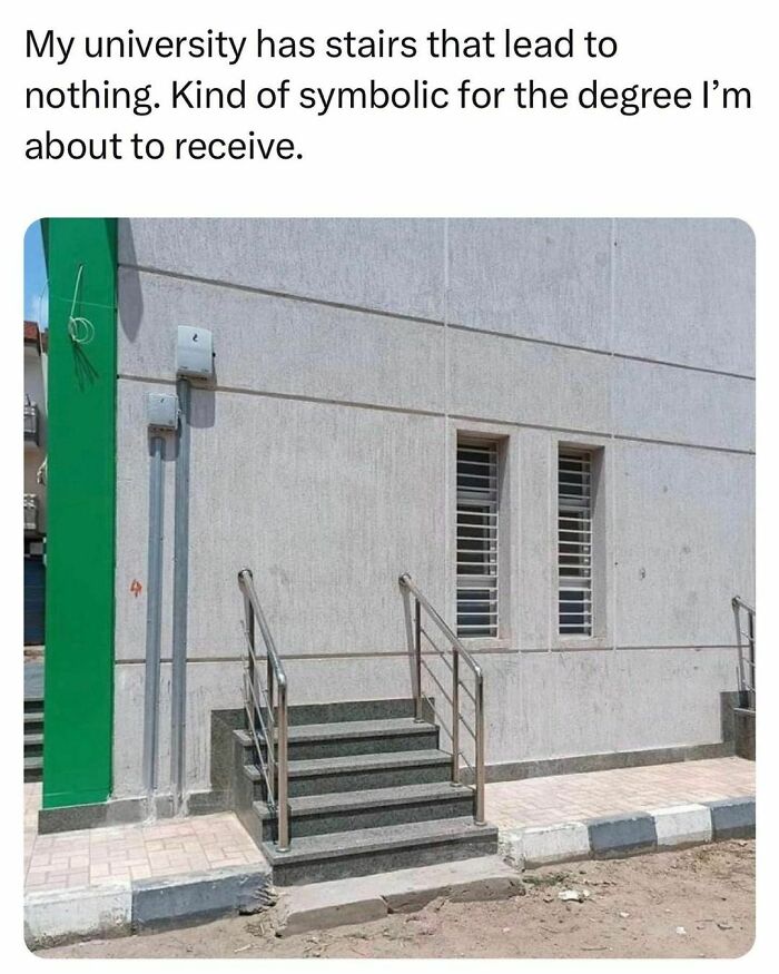 Short stairs outside a university building that lead to a blank wall, symbolizing students and young adults' struggles.