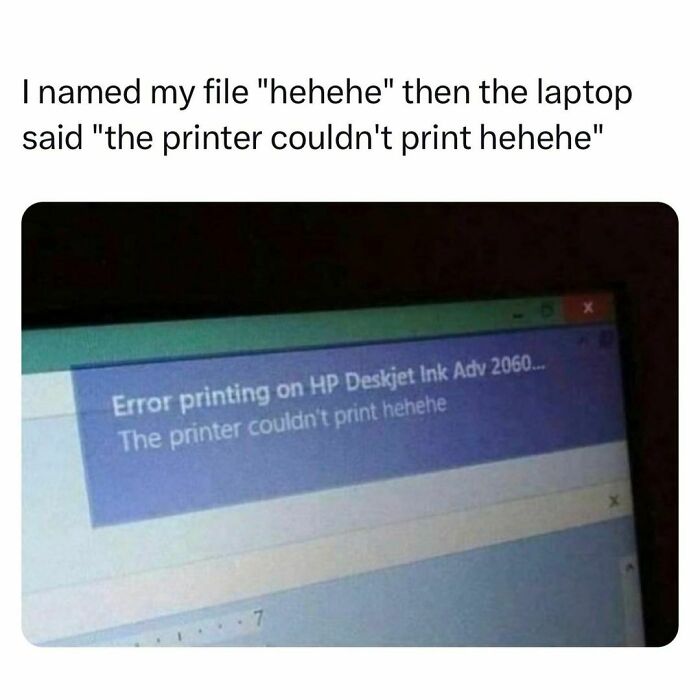 Laptop screen showing printer error message with file named hehehe, highlighting funny struggles of students and young adults.