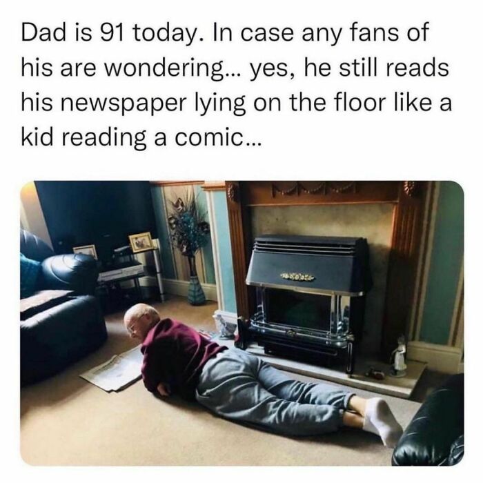 91-year-old dad lying on the floor reading a newspaper like a kid, showing contrasting moments of life for young adults and students
