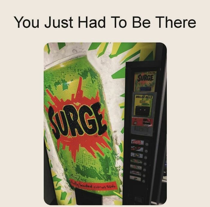Vintage Surge soda vending machine with bright green and orange design, evoking nostalgic memories from past decades.