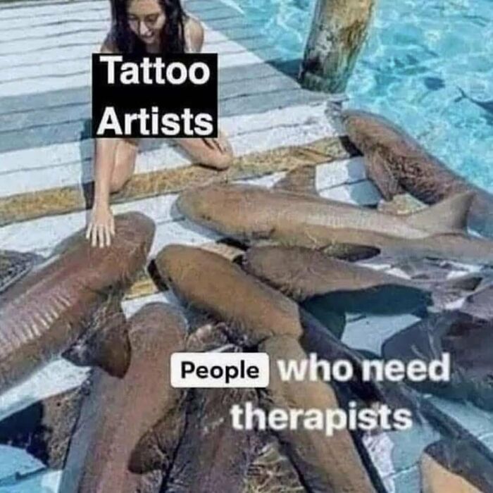 Person labeled "Tattoo Artists" kneels by labeled sharks, "People who need therapists," depicting humor about barely functioning.