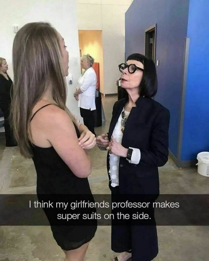 Two women having a conversation in a room, resembling a humorous meme about a professor's secret side job.