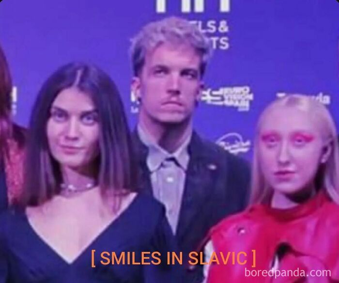Group posing humorously at Eurovision 2024, with "Smiles in Slavic" text overlay.
