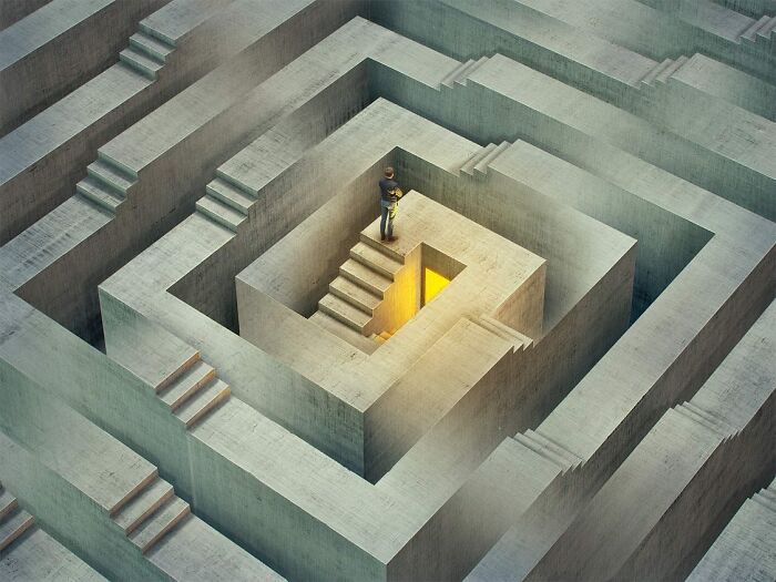 Person standing in a surreal, maze-like structure with stairs by Photoshop master Erik Johansson.