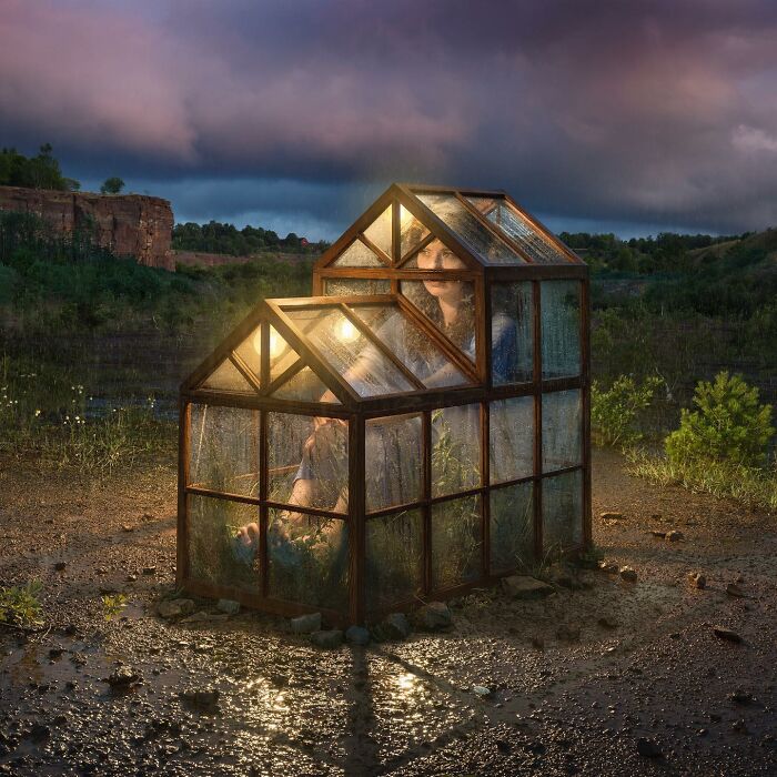 Person inside a glowing greenhouse, illustrating mind-bending photo manipulation by Swedish Photoshop master.