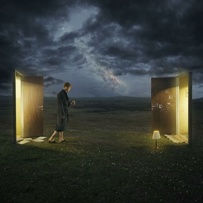Surreal photo manipulation by Swedish Photoshop master with doors leading to unexpected places under a dramatic sky.