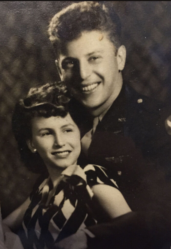 A vintage photo of Bob Lane and Georgia, a smiling couple, intertwined with the story of the B-29 Superfortress tattoo connection. A vintage photo of Bob Lane and Georgia, a smiling couple, intertwined with the story of the B-29 Superfortress tattoo connection.