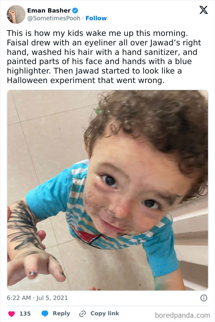 Child with messy face and arms covered in eyeliner and marker, illustrating parents having a pretty miserable day experience.