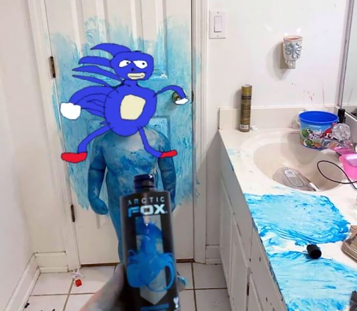 Child covered in blue paint with a messy bathroom, illustrating parents having a pretty miserable day moment.