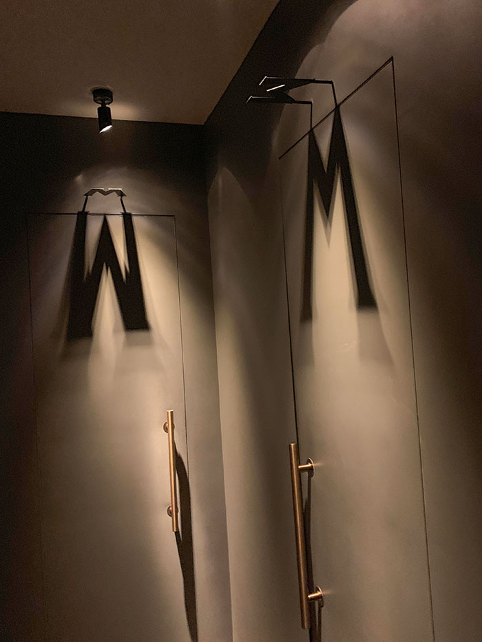This Restaurant Uses Shadows To Show Men's And Women's Restrooms