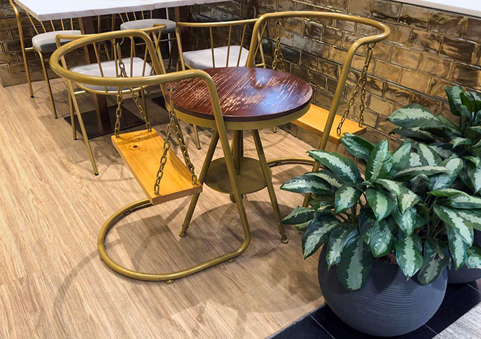 Swing Chairs Inside Of A Cafe In Singapore International Airport