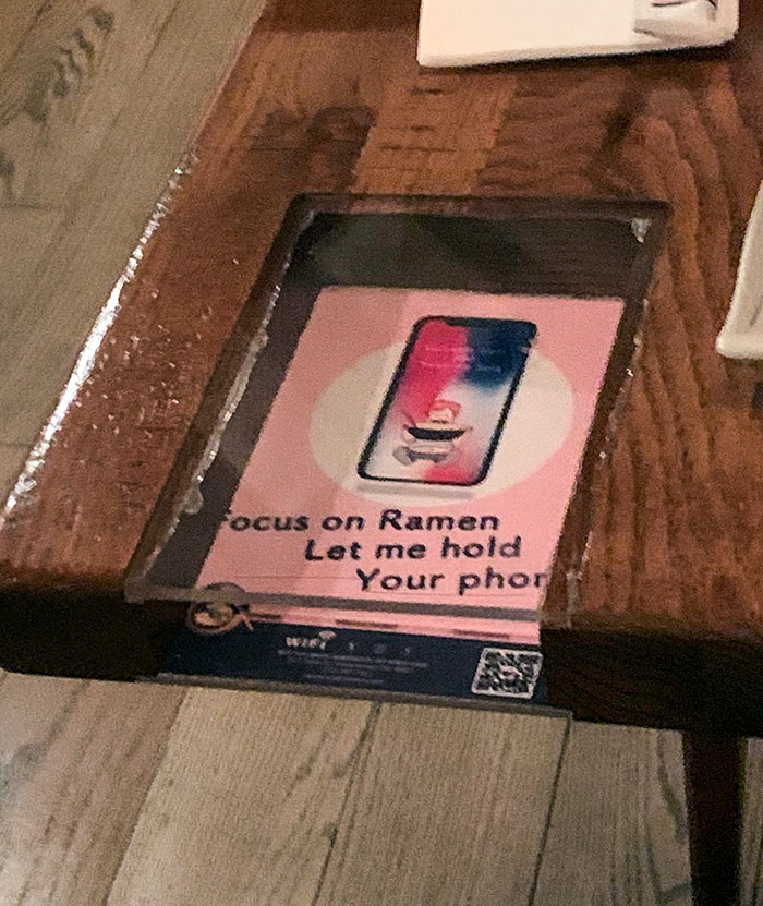 This Ramen Place I Went To Has A Spot In Their Tables To Hold Your Phone. It Encourages You To Spend Time And Talk With Those You Came With Instead Of Being On Your Phone