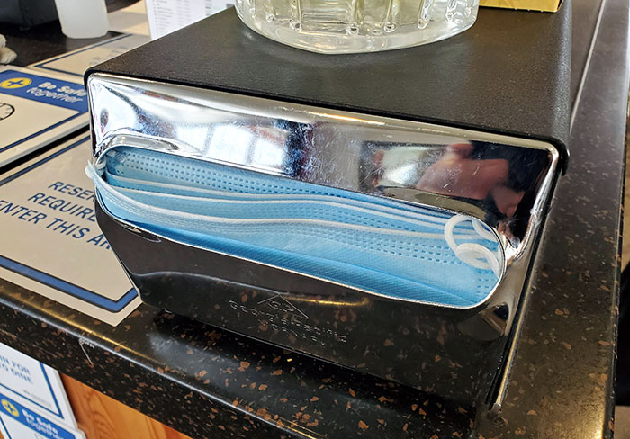 This Restaurant Figured Out That Face Masks Fit In The Napkin Dispenser