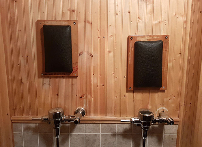 There Are Headrests Above The Urinals In This Bar