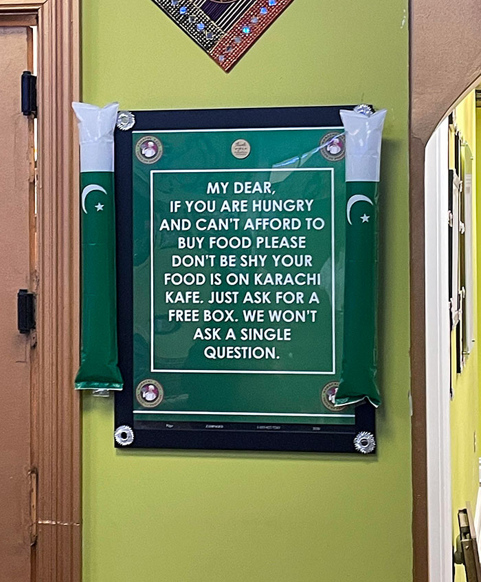 Sign offering free food to those who can't afford it, showcased in a bar and restaurant with brilliant ideas.