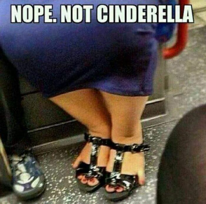 Woman in a blue dress and black sandals on a subway, with text "Nope. Not Cinderella" for Disney adults meme.