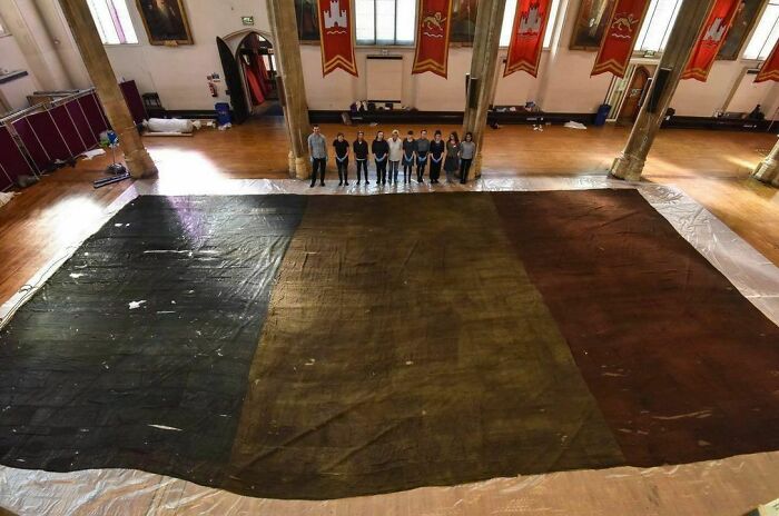 The Giant Flag Of The French Ship Le Genereux, Which Was Captured By One Of Admiral Nelson's Captains Sir Edward Berry At The Battle Of Malta Convoy In 1800. (With Humans For Scale)