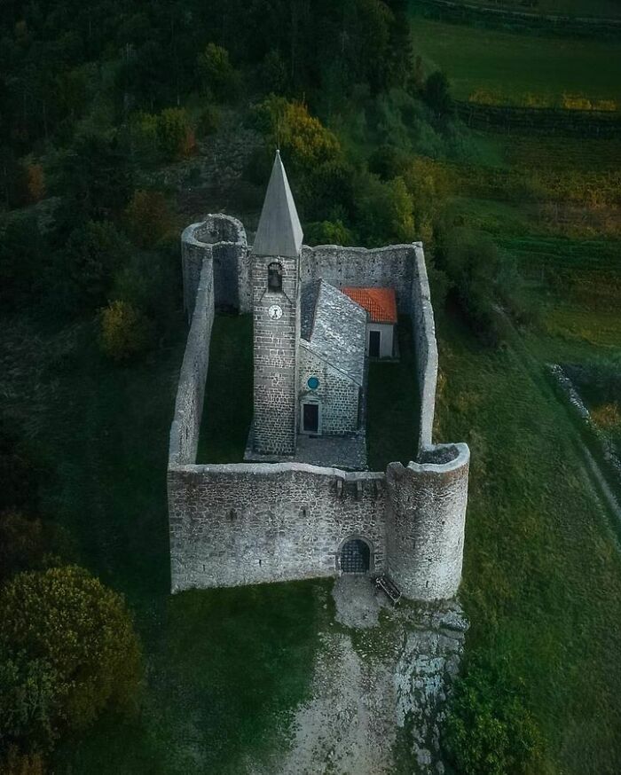 Holy Trinity Church, A Historical Building In Hrastovlje, A Village In Southwestern Slovenia, It Is A Romanesque Church From 12th Century Ce. Church Stands Behind A Wall That Local Population Built To Protect Itself From Turkish Attacks In 16th Century Ce