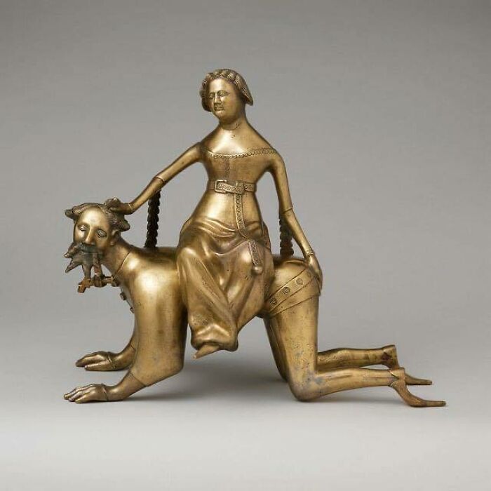 Aquamanile Depicting Airstotle's Girlfriend,phyllis,riding Him Around The Garden After Aristotle Warned Alexander The Great About Women.copper Alloy,south Lowlands,14th-15th Century Ce(Metropolitan Museum Of Art In New York City)