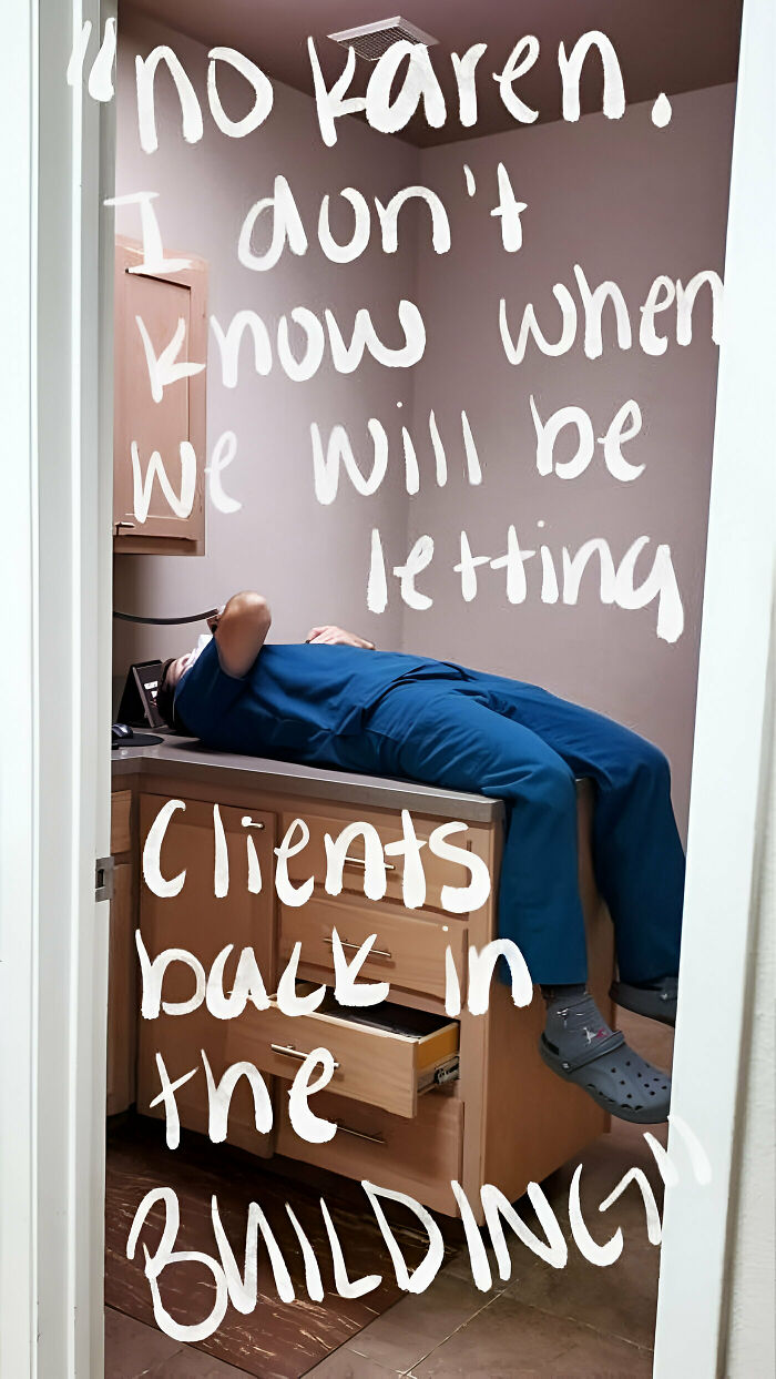 Veterinarian in scrubs humorously resting on cabinet, reflecting a funny moment at the veterinarian's office.