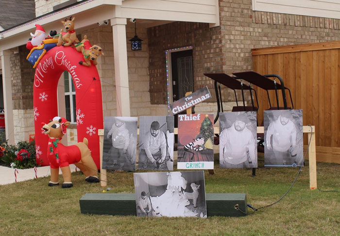 My Neighbor Got His Reindeer Decorations Stolen, So They Put Out Grinch Ones Instead