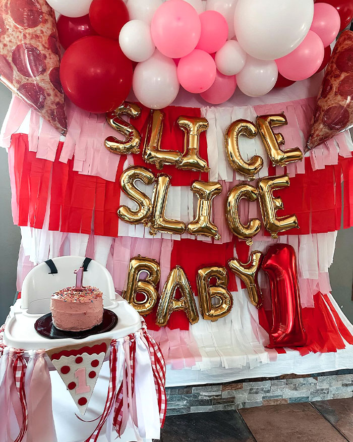 The Theme For This 1-Year-Old’s Birthday Is “Pizza Party” And Not “Let’s Cut The Baby Up” Like I Originally Thought, Thanks To The Writing On The Balloon Wall