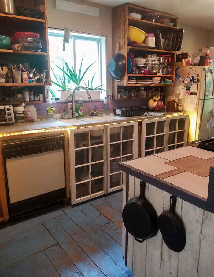 Upcycled Kitchen. Cabinets And Countertops Are Built From Our Own Floorboards, Doors From Old Windows, And Countertops From Tile Scraps