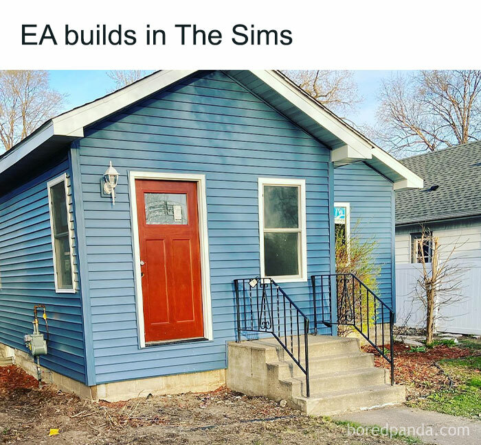 Small blue house resembling a basic design from The Sims, with a simple front porch and red door.