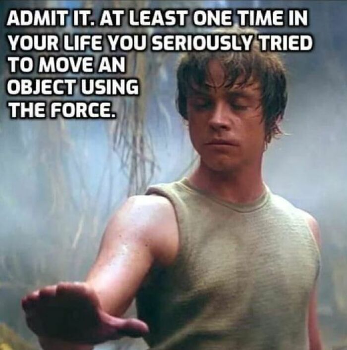 Man humorously attempting to use the Force, referencing hilarious memes and nerd culture.